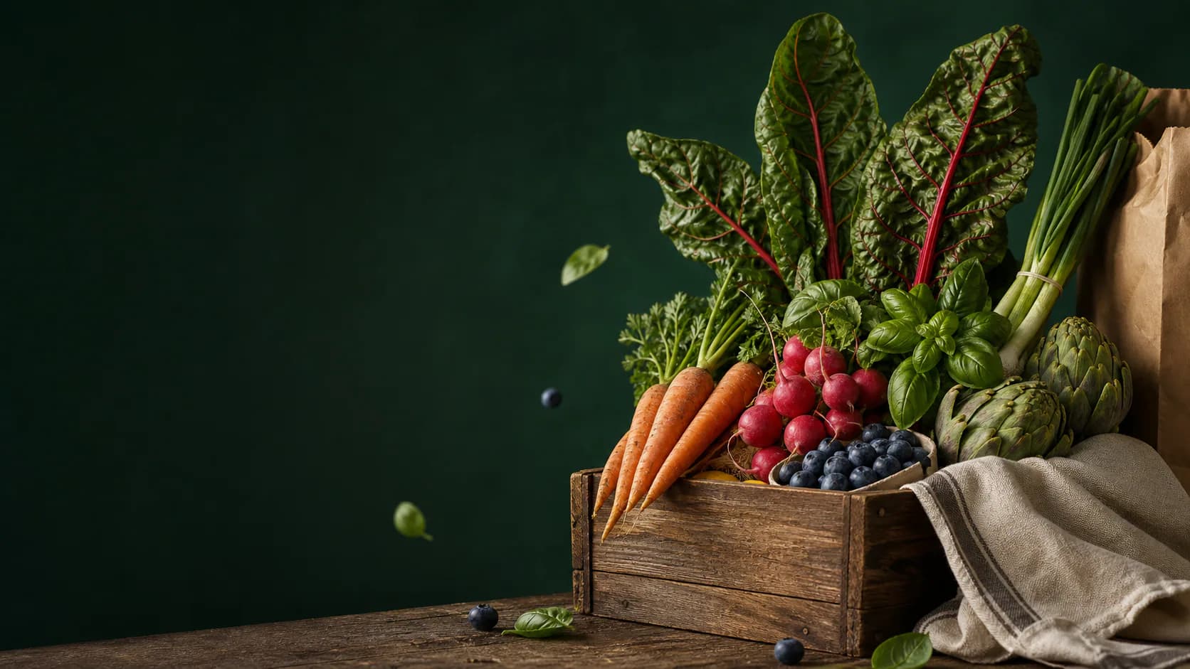 A wooden crate filled with fresh local produce